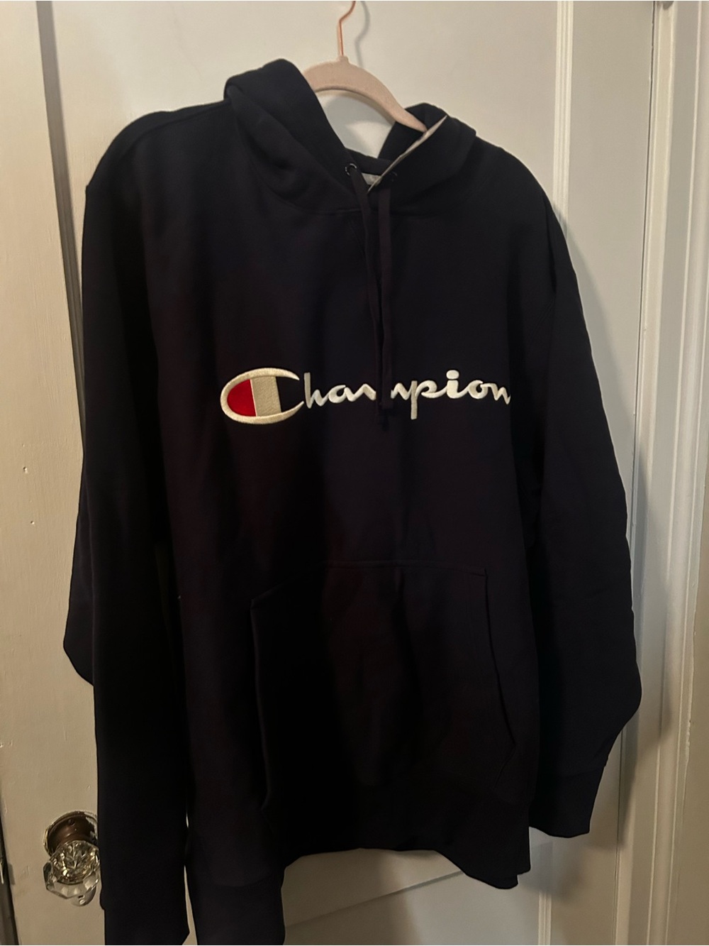 Champion Black Hoodie with White Script and Red Logo Accent